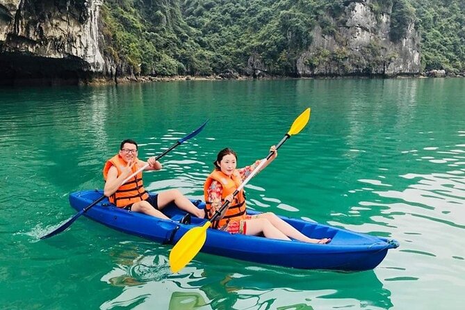 Halong Bay Full-Day with 6 Hour Cruise Kayaking, Swimming, Lunch - Ti Top Island and beach time: views, swimming, and a real photo window