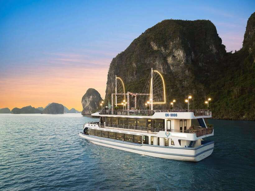 Halong Bay Luxury Cruise: Kayak&Swim,Cave, Party BEST SELLER - Titov Island: swim, beach time, or Titov Peak views