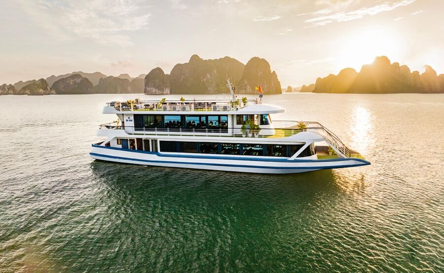 Halong Bay Luxury Cruise with Kayaking & Lunch Buffet - Sunset Party on the Bay: Tea, Fruit, Cake, and a Little Red Wine