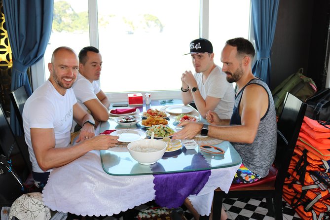 Halong Day Tour: Islands, Cave, Kayak. Lunch. Transfers - Ba Hang fishing village: calmer scenery after the cave and kayak