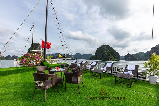 Halong deluxe cruise 2D/1N: Surprise cave, Titop island, Full Meals, best prices - Day 2: Titop Island sunrise, then beach and views from the top