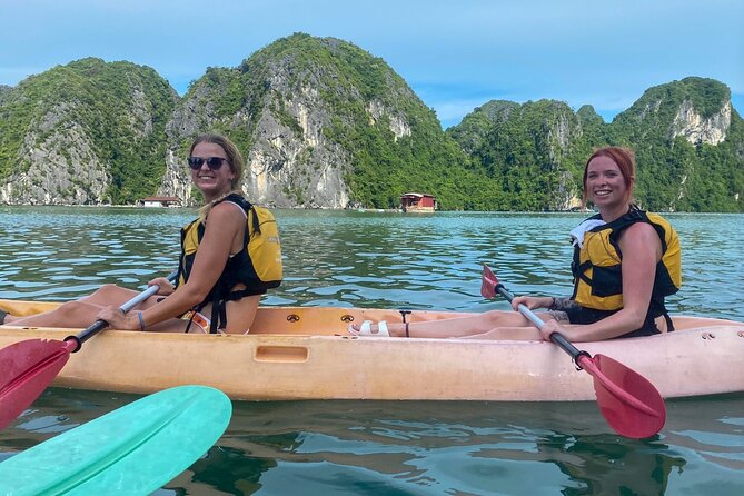 Halong Royal Palace Cruise 2 days - Day 1 onboard activities: tai chi, cooking demo, squid fishing, sunset party