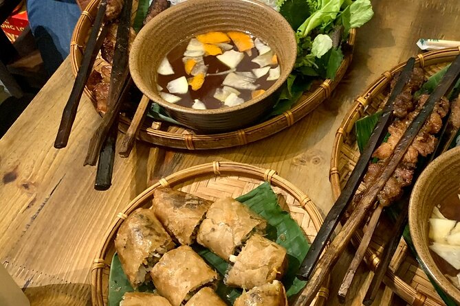 Hanoi After Dark Vespa Tour (4 hours): Street Food & Night Vibes - Stop 6: Hanoi Train Street, the viral photo moment with local drinks