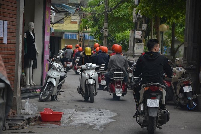 Hanoi Back Streets Vespa Tours: Hanoi Insider Vintage Vespa Tour - Stop 2: West Lake photos, then the Mausoleum and rail-track area from the road