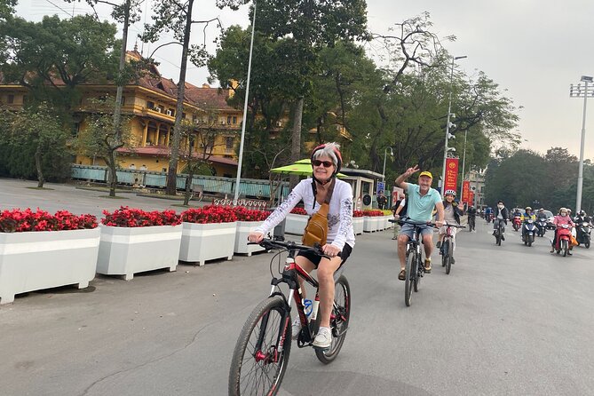 Hanoi City Bike Tour through Banana Island & Food Tasting - Stop 1: Long Bien Bridge, the classic ride that feels historic