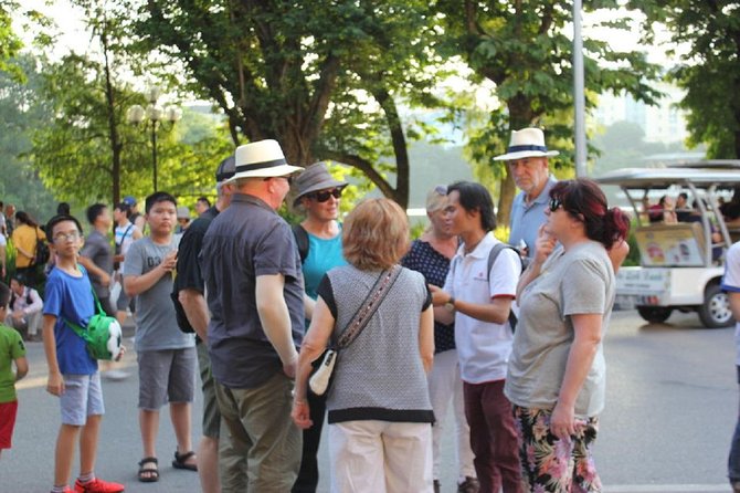 Hanoi City Street Food Night Tour by Motorscooter - Tastings at street vendors: how the guide shapes the meal