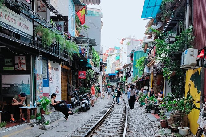 Hanoi city tour and drinking beside railway- group tour - Duong Tau, Train Street With Beer, the Most Interesting Stop That Can Change