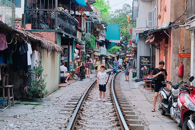 Hanoi city tour and drinking beside railway- group tour - Who Your Guide Really Makes the Day Better
