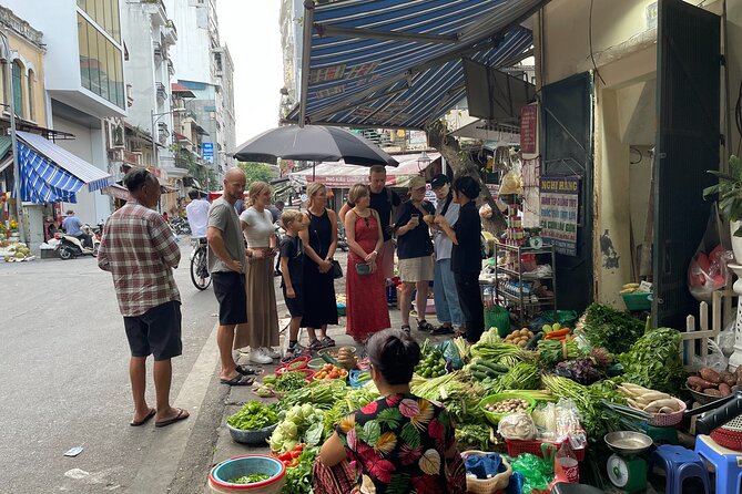 Hanoi Cooking Class Learning 5 Dishes including Banh Xeo - Coffee, Tea, and Vietnamese Rice Liquor at the Table