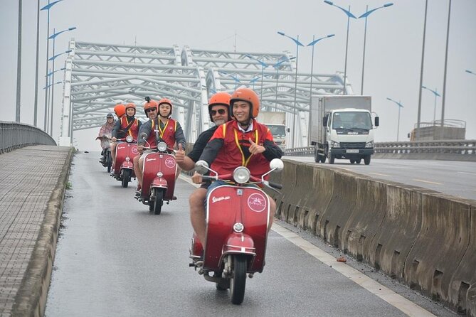 Hanoi Food Tours: Hanoi Foodie Scooter Tour Led By Women - Sightseeing while you eat: Train Street, Red River, and West Lake
