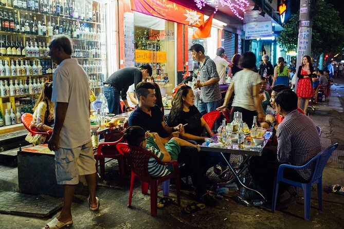 Hanoi Food & Train Street Tour - Train Street at the end: coffee, seats, and the inches-away thrill