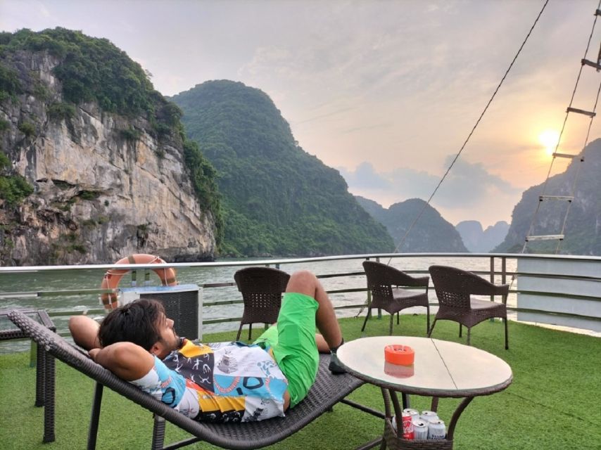 Hanoi: Ha Long Bay Day Cruise - Swimming, Meal, Kayaking - Titop Island: swim, hike, and the payoff view