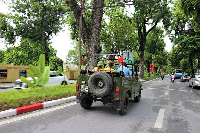 Hanoi Jeep Food Tours Led By Women - Passing the Ho Chi Minh memorial: a moment of ceremony on the route