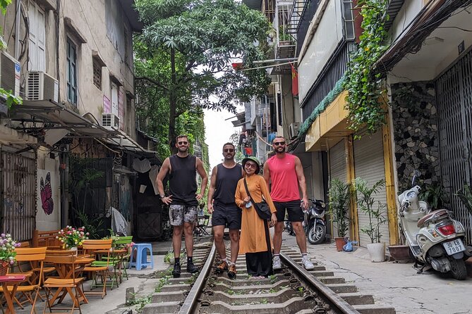 Hanoi Jeep Tours Led By Women: City & Red River Half Day - Stop 1: Long Bien Bridge, plus the Jeep safety briefing
