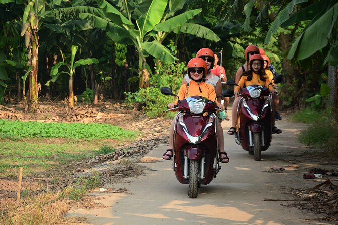 Hanoi Motorbike Led By Women: Hanoi Countryside Motorbike Tours - Long Bien Bridge to the 800-year-old village: tea, candy, bonsai, and photos