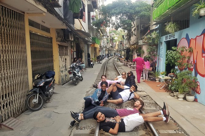 Hanoi Motorbike Tour: Food, Culture and Fun by Vintage Motorbike - Hanoi Train Street: coffee while you watch the train pass