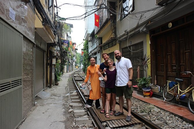Hanoi Motorbike Tour Led By Women: Hanoi City Half Day - Duong Tau Reunification tracks: seeing daily life beside rail lines