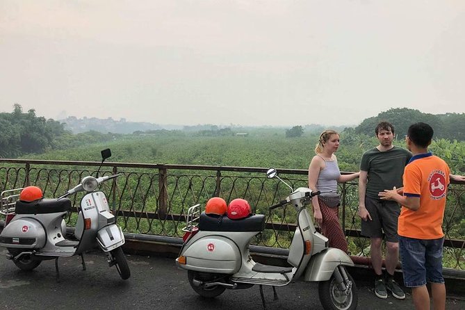 HANOI MUST SEE SITES Vespa Tour - Old Quarter loop and the 36 guild streets passing scene
