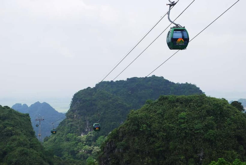 Hanoi: Perfume Pagoda Day Tour with Boat Ride & Cave Visit - Yen Stream boat ride from Ben Duc Pier, plus weather reality