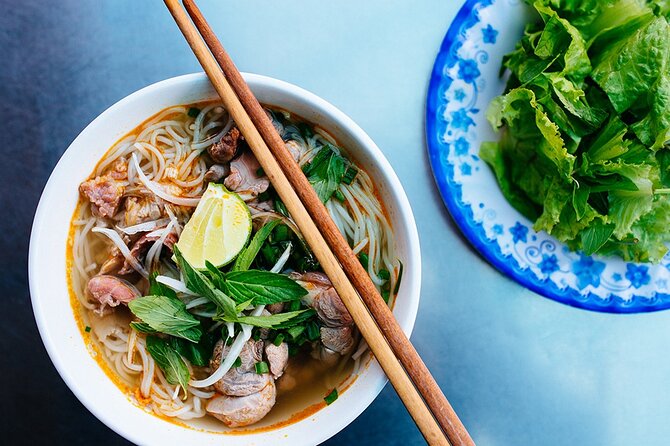 Hanoi Street Food Tour By Motorbike + Sightseeing SAFE & FUN - Hanoi landmarks between bites, from Opera House to Big Church