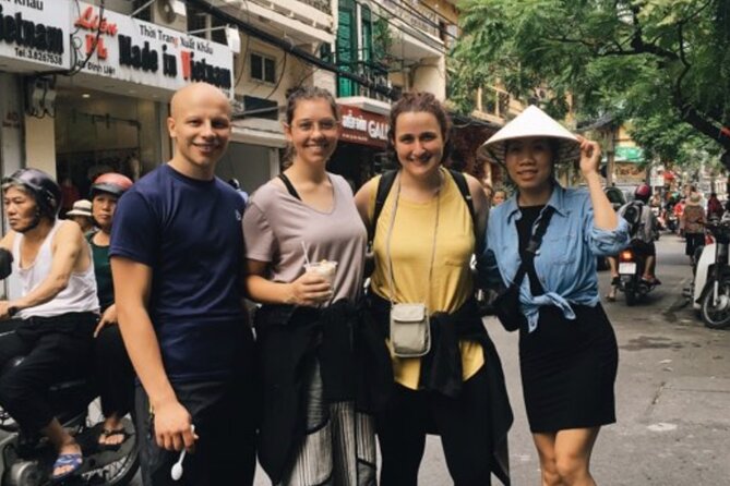 Hanoi Street Food tour by Scooter – Local Experience - Your evening starts at a local market, then moves indoors for stories