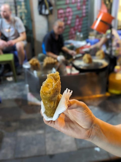 Hanoi: Street Food Tour with Train Street & Hidden Alleyways - The lineup of savory dishes between Old Quarter and Train Street