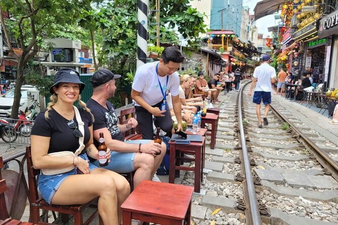 Hanoi street food walking and train street visit - Train Street Close Up: When Your Dinner Stops for Rails