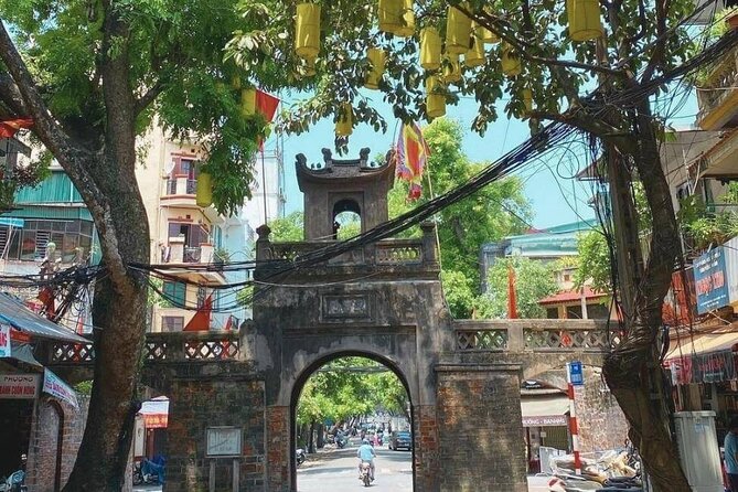 Hanoi Train Street Food Walking Tour - Dong Xuan Market: More Than Souvenirs, It’s a Food and Goods Hub
