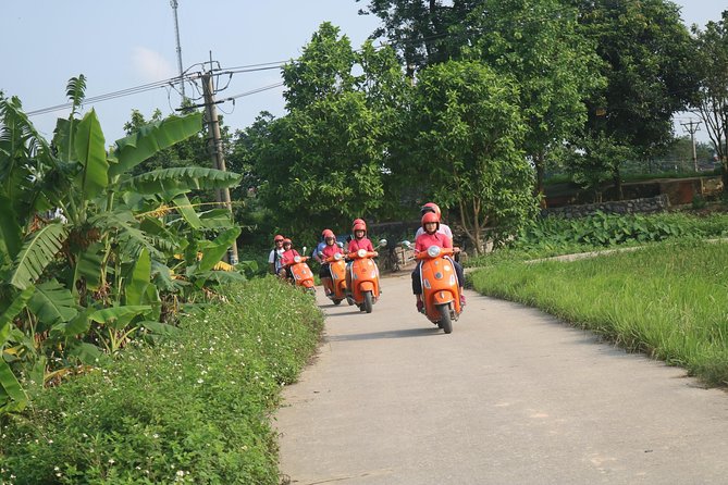 Hanoi Vespa Full Day City & Countryside with Female Ao Dai Riders - Ba Dinh Square Ride-Through and An Duong Market Shopping Energy