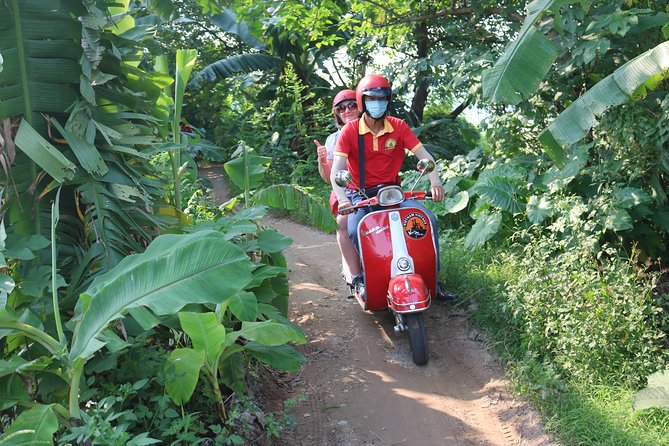 Hanoi Vespa Tour Explore Red River Delta & Rural Villages 5 Hours - Safety and comfort: helmets, ponchos, and pacing for small groups