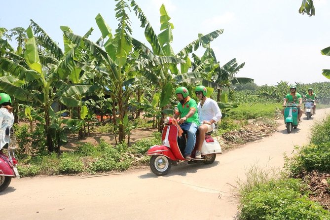 Hanoi Vespa Tour Explore Red River Delta & Rural Villages 5 Hours - Long Bien Bridge: an easy pause with a real sense of place