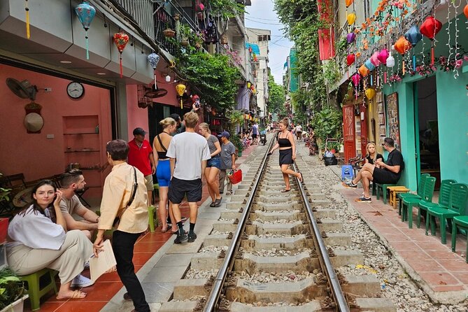 Hanoi Walking Street Food Tour with Train Street - Waiting for the train: how to make the most of the photo moment