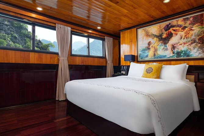HERA CLASSIC Boutique Cruise Halong Bay 2 Days 1 Night Trip - Day 1 on the water: welcome moment, cave and kayak time, then sunset and squid