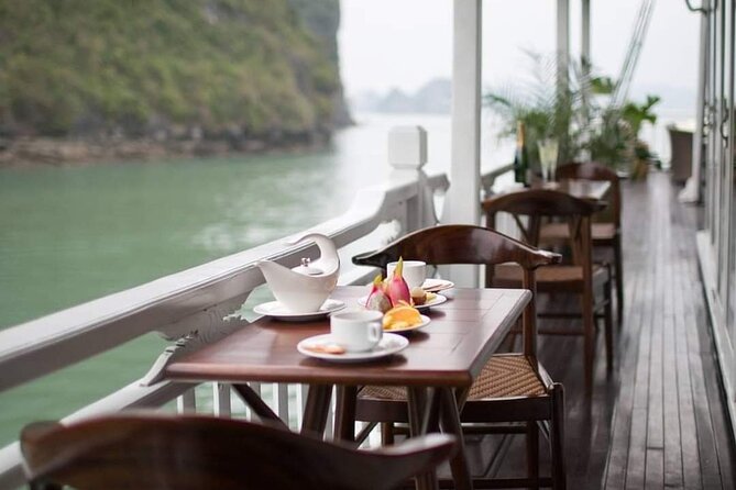 Hera Classic Cruise 2 Days 1 Night Halong Bay With BALCONY CABINS - Day 2 morning routine: Tai Chi, light breakfast, then Sung Sot Cave