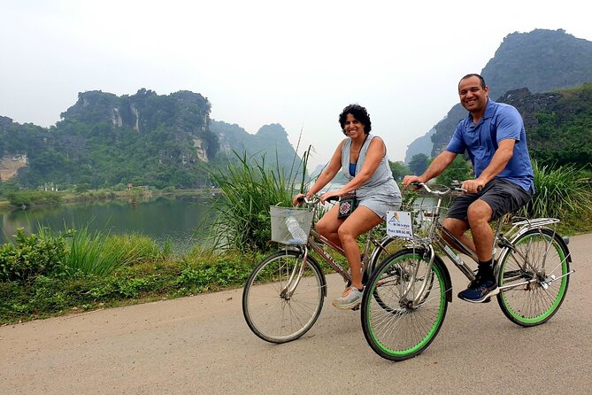 Highlight Ninh Binh Full Day Tour Tam Coc Boat, Mua Cave, Hoa Lu - Tam Coc Bamboo-Boat Ride: The Most Relaxing Part of the Day