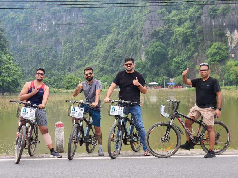 Hoa Lư and Tam Cốc with Bike Ride and Family Visit - Tam Coc by boat, limestone caves and the scenic rhythm