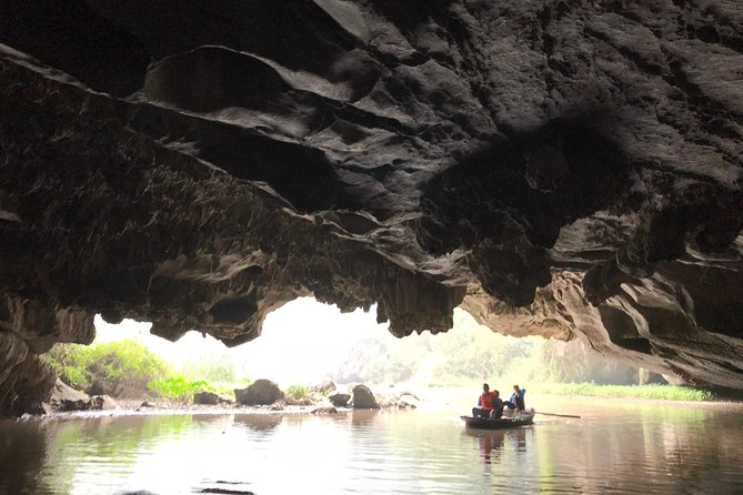 Hoa Lu - Mua Cave - Tam Coc/Trang An - DELUXE Small Group Tour - Boat through Trang An Grottoes or Tam Coc on a traditional sampan