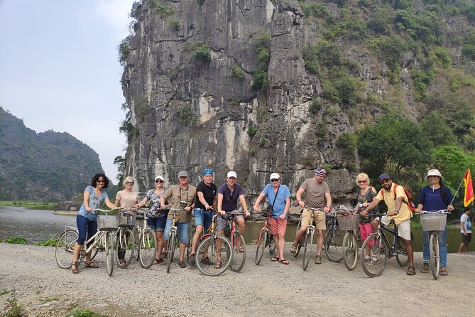 Hoa Lu - Tam Coc - Mua Cave 1 Day with Cycling, Hiking, Lunch - Getting There: Meeting at Hanoi Opera House and Riding an AC Bus