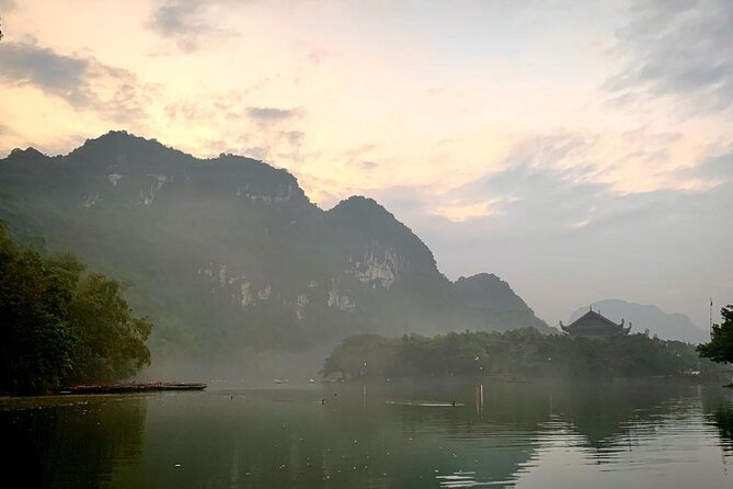 Hoa Lu - Tam Coc - Mua Cave Full Day - LIMOUSINE - Tam Coc bamboo boat (1.5 hours): the Ha Long Bay on land moment
