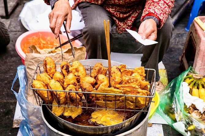 (HOT) Hanoi Guided Street Food and Train Street Tour with Local - Old Quarter walking, trade streets, and passing French-era landmarks