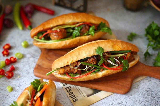 (HOT) Hanoi Guided Street Food and Train Street Tour with Local - St. Joseph’s Cathedral in about 10 minutes, photo stops included