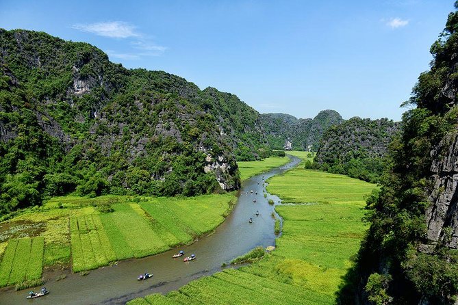 Ninh Binh Daily Tour: Hoa Lu- Am Tien Cave - Tam Coc- Bike - Bich Dong pagoda - Tam Coc by sampan on the Ngo Dong River: limestone scenery, local rowing, and real calm