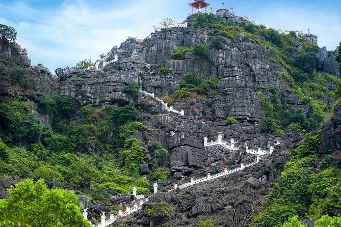 Ninh Binh Daily Tour: Hoa Lu -Mua Cave -Tam Coc- Bike-Swimming with Sunset Party - Lunch at the Bungalow: Simple, Included Fuel
