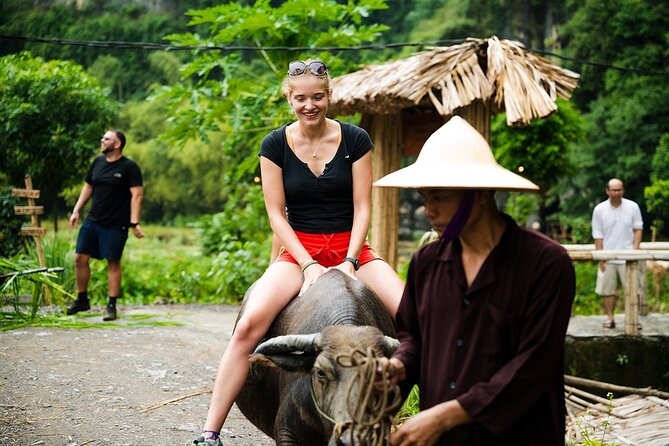 Ninh Binh eco group tour - Buffalo riding, rice planting, fishing - Rice planting in the wet fields: why it is more than a photo
