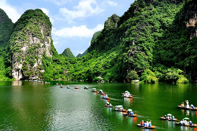Ninh Binh Full Day Tour Group 8 (Trang An- Bich Dong- Mua cave) - Cycling through rice fields and a local family visit