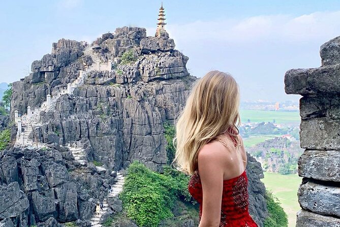 Ninh Binh luxury Day trip to Mua Cave, Tam Coc, Bich Dong, Boat & Bike - Tam Coc sampan: rice fields, limestone, and cave time