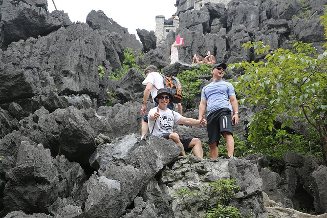 Ninh Binh luxury Day trip to Mua Cave, Tam Coc, Bich Dong, Boat & Bike - Biking through rural roads, then Bich Dong Pagoda