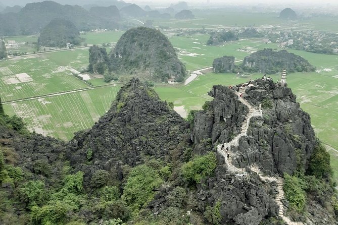 NINH BINH package tour in 2 days/ 1 night: visit world heritage site & eco tour - Day 1: Hoa Lu Temple, Tam Coc boat time, and the Mua Cave climb