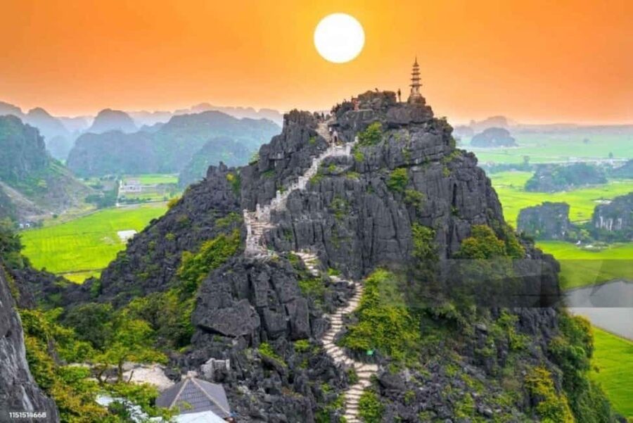 Ninh Binh: Trang An Boat Ride, Hoa Lu & Mua Cave Sunset - Hoa Lu Ancient Capital: Temples With Limestone Mountain Backdrops