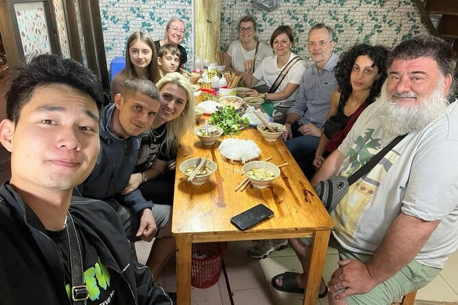 Old Quarter Food Tour in Hanoi - Getting through busy streets and a wet market with help